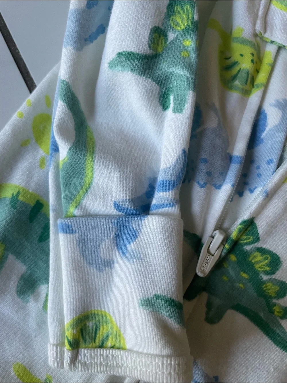 Carter's White Footed One-Piece Pajamas with Green and Blue Dinosaurs